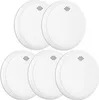 A group of five white smoke detectors are arranged in a staggered pattern against a white background. Produktbild-Vorschau