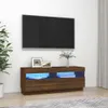 A TV stand with LED lights and a TV mounted on the wall above it. Náhled obrázku produktu