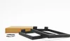 A set of black furniture legs and a brown box are arranged on a white background. Produktbild-Vorschau