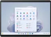 A Microsoft Surface Pro 9 laptop is displayed on a desk with its start menu open. Produktbild-Vorschau
