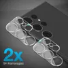 Two clear camera lens protectors are shown in front of a smartphone with multiple camera lenses. Produktbild-Vorschau