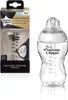 A Tommee Tippee feeding bottle and its packaging are displayed side-by-side against a white background. Náhľad obrázku produktu