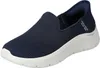 A single navy blue Skechers slip-on sneaker with a white sole, shown from a side-front angle on a white background. Produktbild-Vorschau