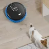 A robot vacuum cleaner is cleaning a wooden floor, leaving paw prints behind a small dog. Náhled obrázku produktu