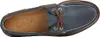 A top-down view of a single blue boat shoe. Voir les images du produit