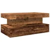 A rustic wooden coffee table with a layered design, presented against a white background. Podgląd zdjęcia produktu