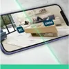 A phone displaying a living room scene with a person relaxing on a couch, split into two resolutions: 2K and 1080p. Produktbild-Vorschau