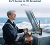 A man steering a boat, with a marine radio on the console. Náhled obrázku produktu