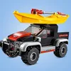 A LEGO City toy truck with a kayak on top. Produktbild-Vorschau
