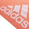 A close-up, angled view of an Adidas towel with the brand logo prominently displayed. Produktbild-Vorschau