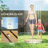 A woman and a child are standing under a garden shower in a grassy backyard. Produktbild-Vorschau