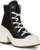 A studio shot of a black high-heeled Converse sneaker. Produktbild-Vorschau