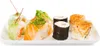 A plate of assorted sushi rolls on a white plate. Produktbild-Vorschau