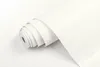 A roll of white adhesive film is shown on a white background. Produktbild-Vorschau