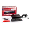 A product shot of a satellite receiver and its accessories, including the box, receiver, remote, and power adapter, arranged on a white background. Produktbild-Vorschau