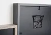 The back of a picture frame is shown, with a hanging mechanism visible. Another picture frame is partially visible in the foreground. Náhled obrázku produktu