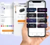 A hand holding a smartphone displaying a Tronsmart app with various audio equalizer settings and speaker connection options. Multiple app screens are layered behind the main screen. Podgląd zdjęcia produktu