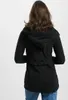 A woman wearing a black hooded jacket from the back. Produktbild-Vorschau