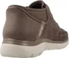 A side view of a brown Skechers slip-on boot. Náhled obrázku produktu