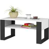 A modern coffee table with a plant, books, and a cup of coffee on it, presented against a white background. Produktbild-Vorschau