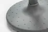 A close-up view of the textured base of a gray office stool. Produktbild-Vorschau