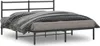 A black metal bed frame with a headboard, shown with bedding. Náhľad obrázku produktu