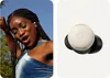 A split image showing a woman dancing on the left and a close-up of Google Pixel Buds Pro on the right. Produktbild-Vorschau