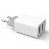 A white dual USB wall charger with gray prongs, shown against a white background. Produktbild-Vorschau