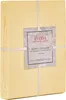 A folded yellow duvet cover is presented in its packaging, tied with a cream ribbon and featuring a product tag. Produktbild-Vorschau