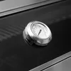 A close-up shot of a thermometer on a black surface. Produktbild-Vorschau