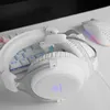 A white gaming headset is placed on a white desk next to a white keyboard and a white gaming mouse. Produktbild-Vorschau