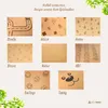 A collage of different cork playmat designs with German labels. Produktbild-Vorschau