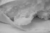 A close-up view of the filling of a pillow, with the white fabric of the pillowcase visible. Náhľad obrázku produktu