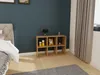 A bedroom scene with a cube shelf unit next to a bed. Produktbild-Vorschau