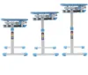 Three adjustable children's desks of varying heights are displayed against a white background. Produktbild-Vorschau