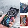 A collage of images showing a phone case with a dreamcatcher design. One image shows the case being held, another shows it in a pocket, and a third shows a person holding it. Produktbild-Vorschau