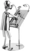 A metallic figurine of an architect working at a drafting table. Náhled obrázku produktu