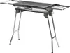 A portable barbecue grill with foldable legs and side shelves, shown from a front-diagonal angle against a white background. Produktbild-Vorschau