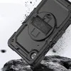 A black tablet case with a hand strap is shown at an angle, with debris flying around it, suggesting durability. Produktbild-Vorschau