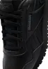 A close-up view of a black Reebok sneaker, focusing on the lacing and side branding. Voir les images du produit