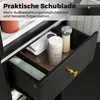 A close-up view of an open drawer in a black cabinet, showcasing various items for organization and storage. Náhled obrázku produktu