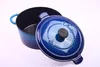 A blue cast iron pot with its lid slightly ajar, displayed on a white background. Produktbild-Vorschau
