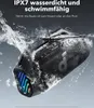 A black speaker is submerged in water, creating splashes. Produktbild-Vorschau
