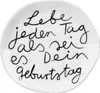 A white plate with black handwritten text. Produktbild-Vorschau
