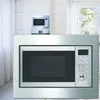 Two microwaves are shown in a kitchen setting. The main focus is on a built-in microwave, with another smaller microwave visible behind it. Produktbild-Vorschau