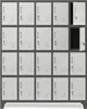 A metal locker unit with 20 compartments, arranged in a 4x5 grid. Some of the locker doors are open, revealing the dark interior. Náhľad obrázku produktu