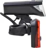A black and red bicycle light set is shown against a white background. Náhľad obrázku produktu