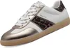 A single white sneaker with gold and leopard print accents is shown against a white background. Voir les images du produit