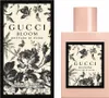 A product shot of a Gucci Bloom Nettare di Fiori perfume bottle and its packaging. Produktbild-Vorschau