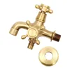 A brass faucet with two outlets and a decorative plate, isolated on a white background. Podgląd zdjęcia produktu